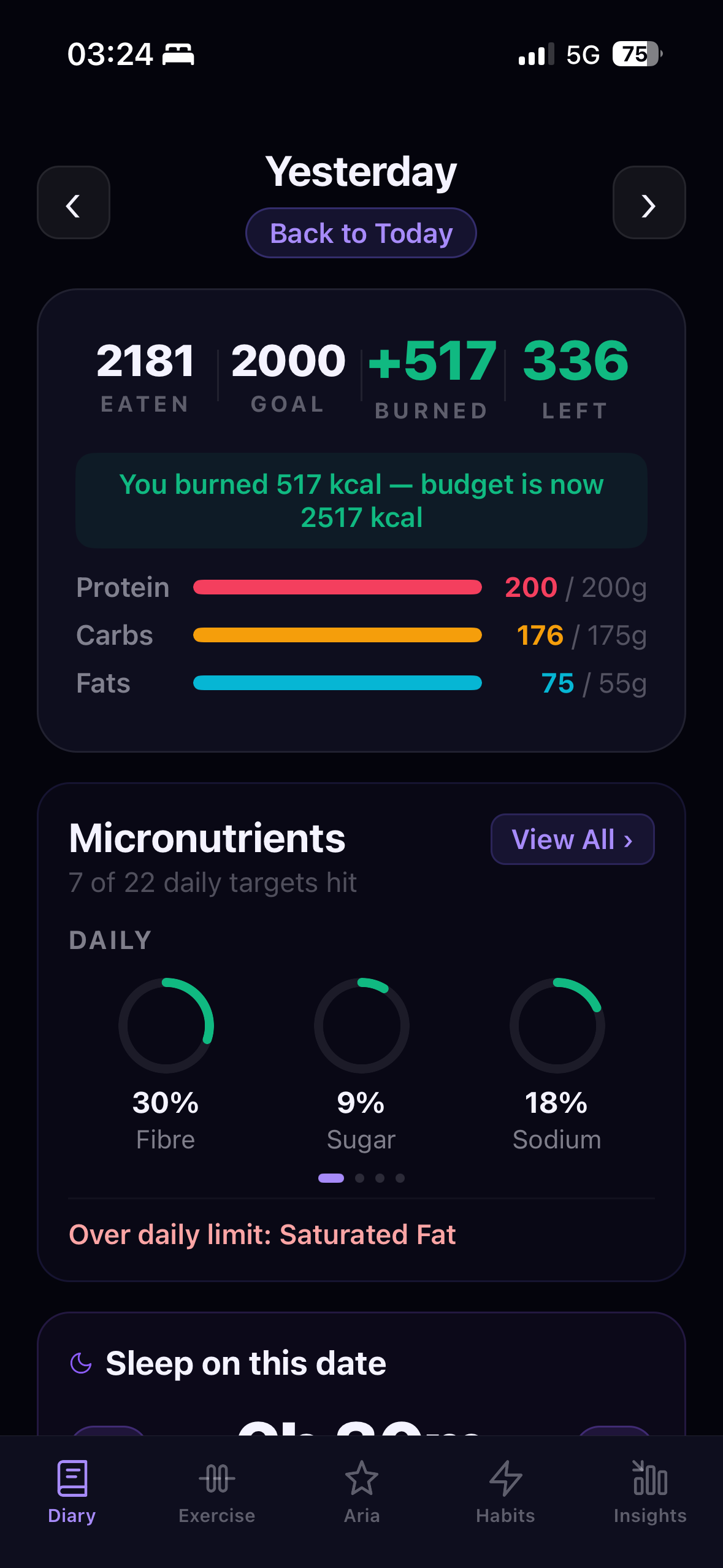 Diary tab with logged meals, macros, and progress rings